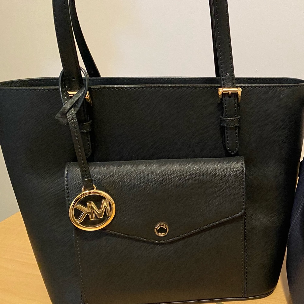 Micheal Kors black back never used